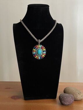 Southwestern-style necklace and pendant  with a flower blossom design boho